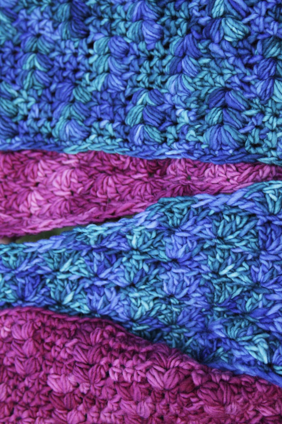 Close-up of matching crochet cowls