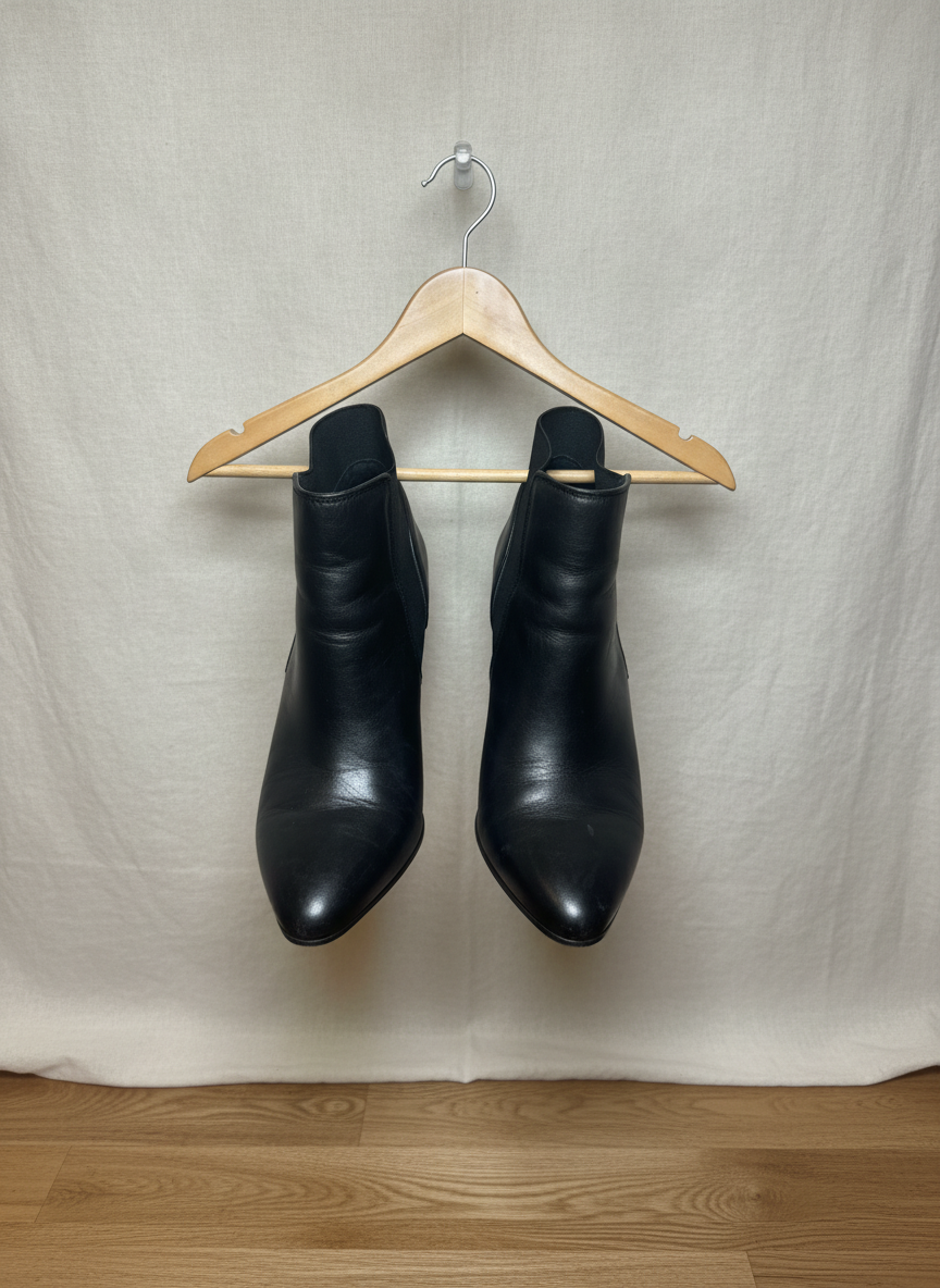 Franco Sarto Sleek Black Ankle Boots - Studio Shot