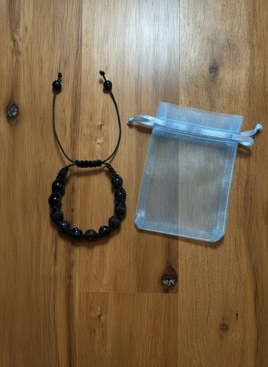 Elegant Black Beaded Bracelet - Styled Flat-Lay