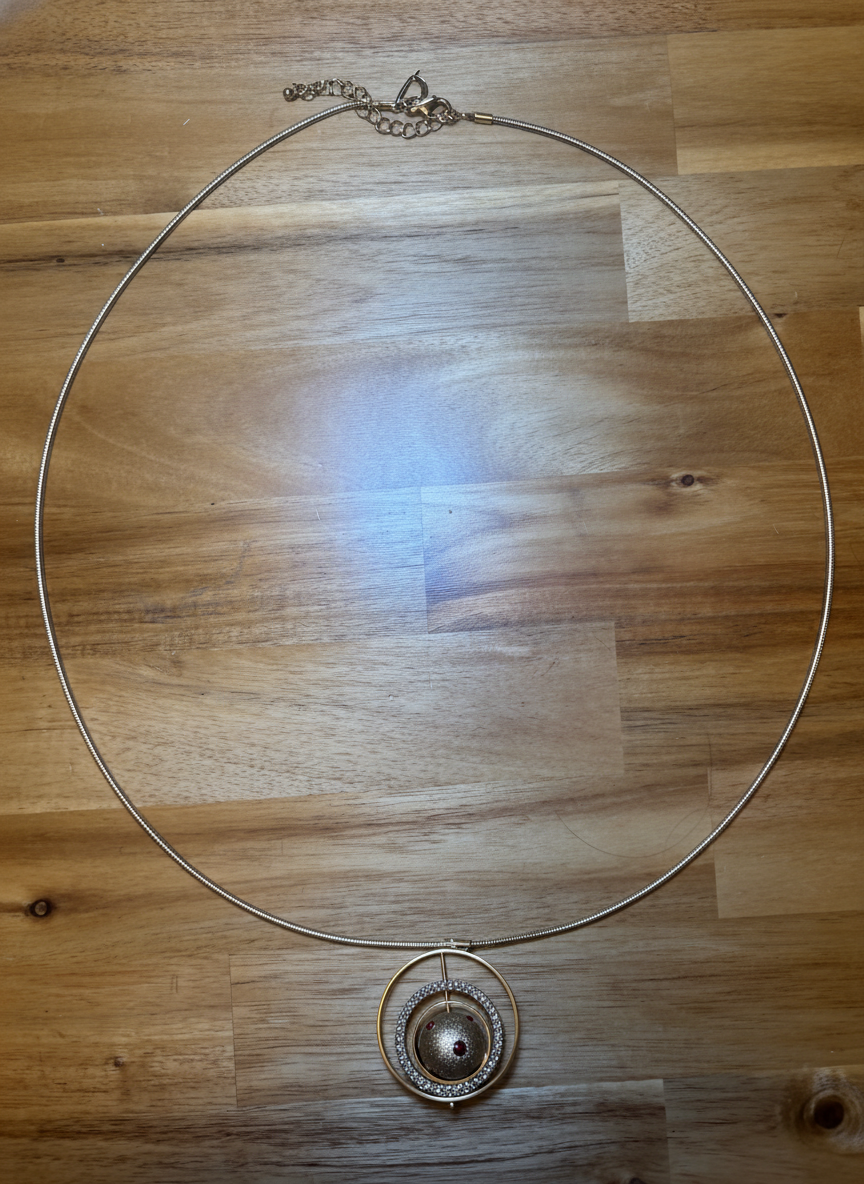 Elegantly Dazzling Orb Necklace - Styled Flat-Lay