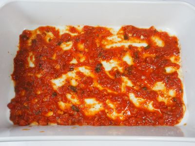 Put a Light Coating of Sauce on the Bottom of the Pan