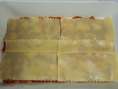 Place a Layer of Noodles Over the Sauce