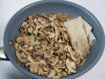 Remove the Excess Liquid from the Mushrooms with Paper Towels