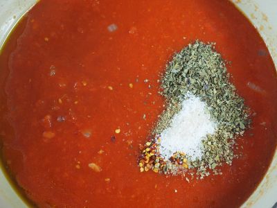 Adding the Herbs, Spice and Salt to the Pot