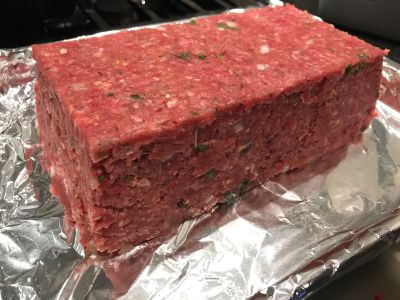 Meatloaf with Parchment Paper Removed and Ready for the Glaze