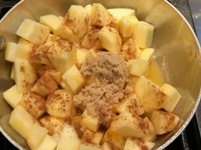 Apples, Orange Juice, Sugar and Cinnamon in the Saucepan