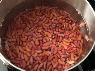 Beans in a Pot Covered with Water for Pre-Cooking