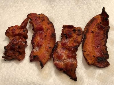 Crispy Fried Bacon Draining on Paper Towels