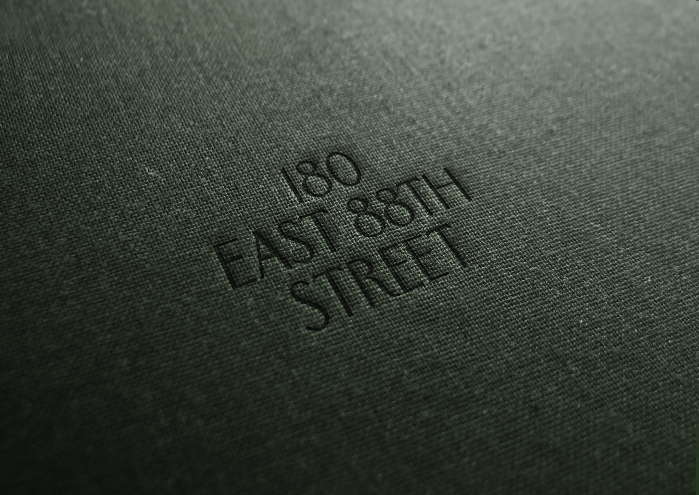 close up of embossed logo of 180 E 88th street