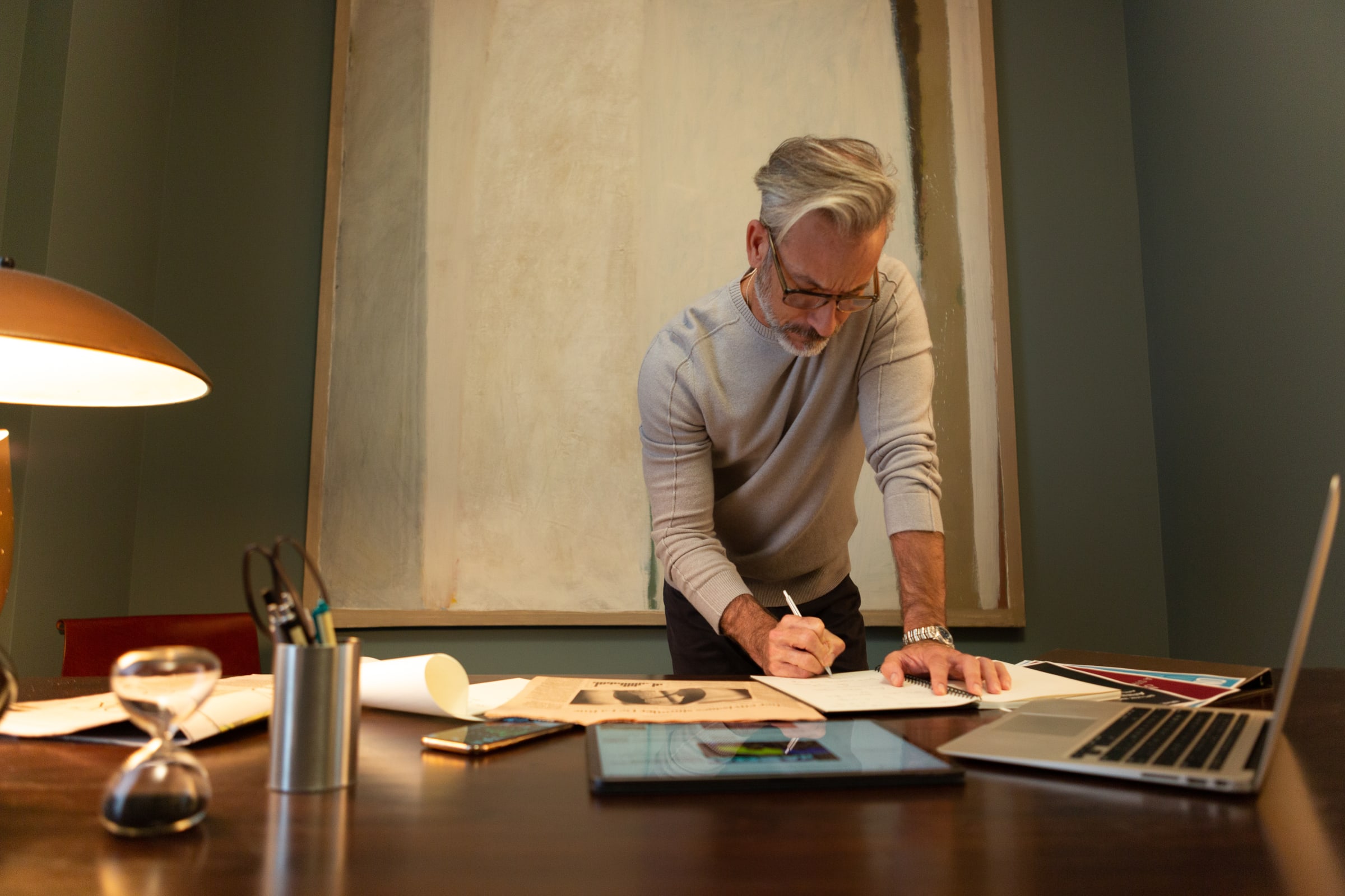 Art husband working in his home office at 180 E 88th Street, a luxury condominium in the Upper East Side of Manhattan