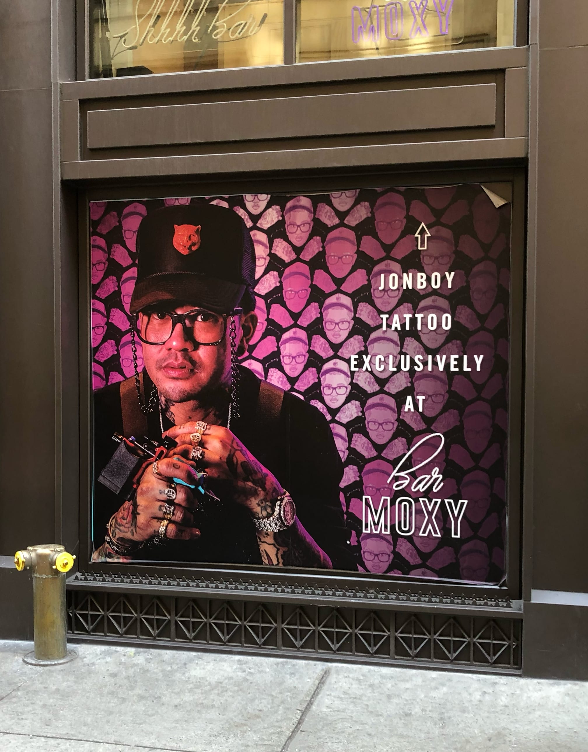 moxy times square Jon Boy window sign