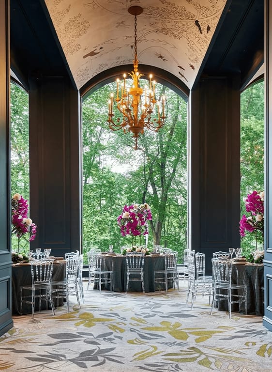 Park Lane Hotel dining interior with arched windows and Central Park backdrop