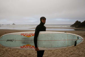 Matt Cameron with surfboard