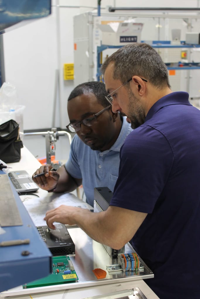 employees in the lab working together