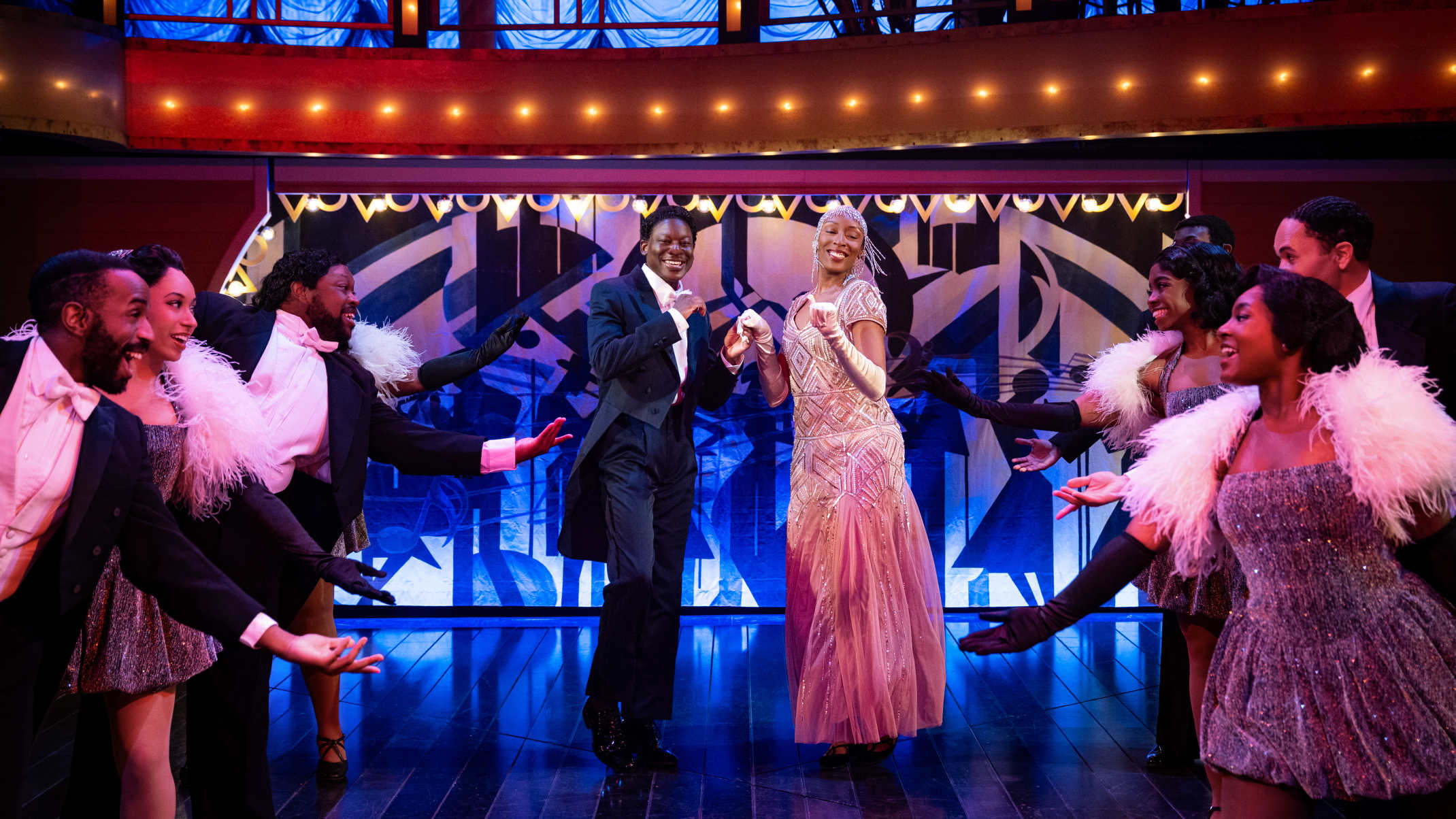 Greg Watkins (Duke), Jalisa Williams (Vy), and the cast of Play On!