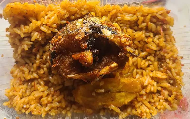 a Plate of Mixed rice with croaker fish