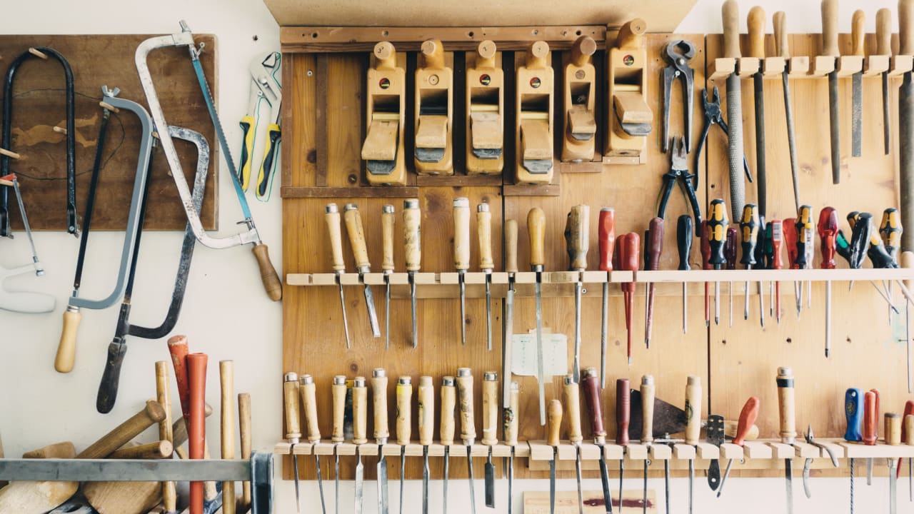 Hanging tools on a workshop wall