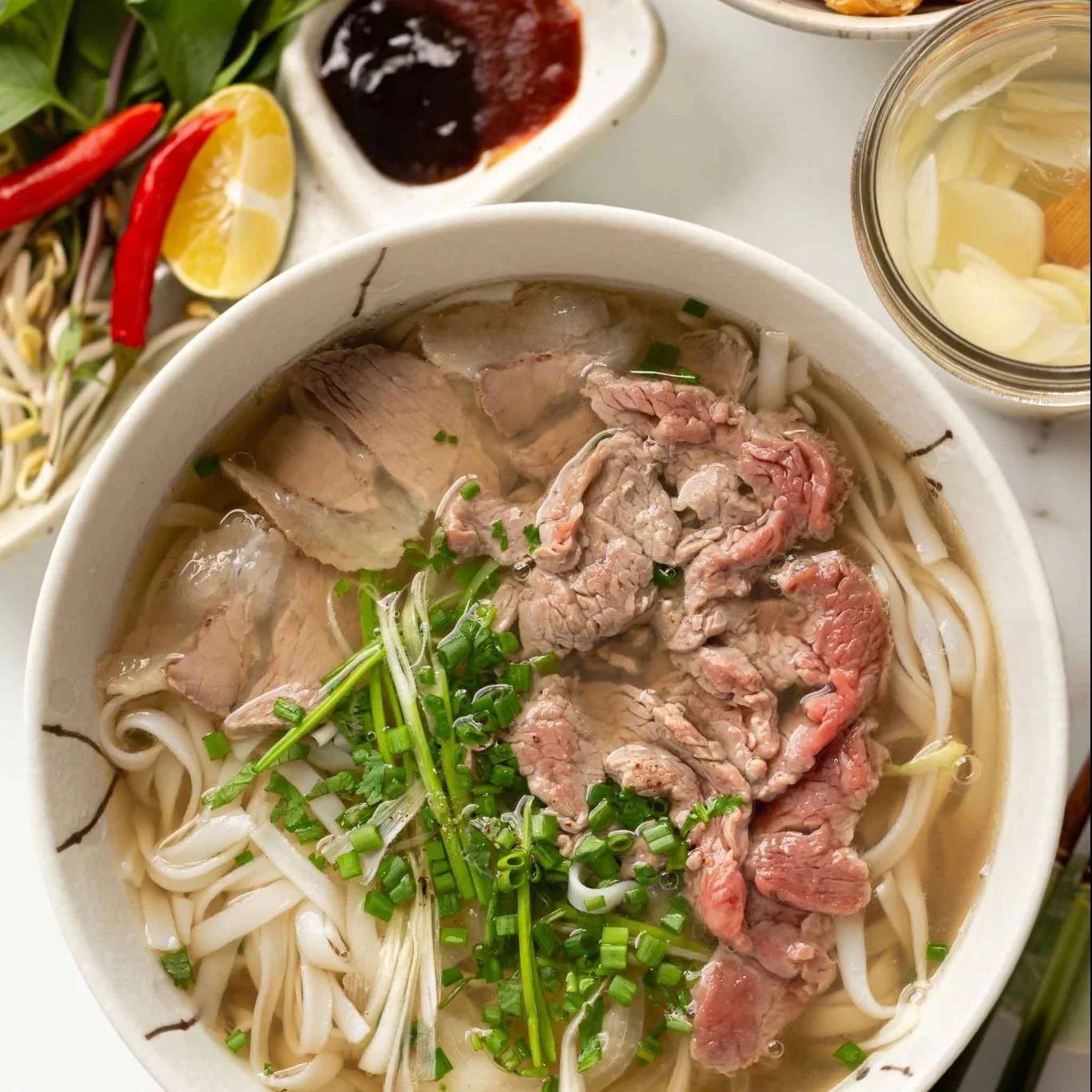 31. Pho Dac Biet - Combination: Rare steak, brisket, tendon and tripe