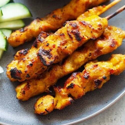 A14. Chicken or Pork Stays on sticks with sauce