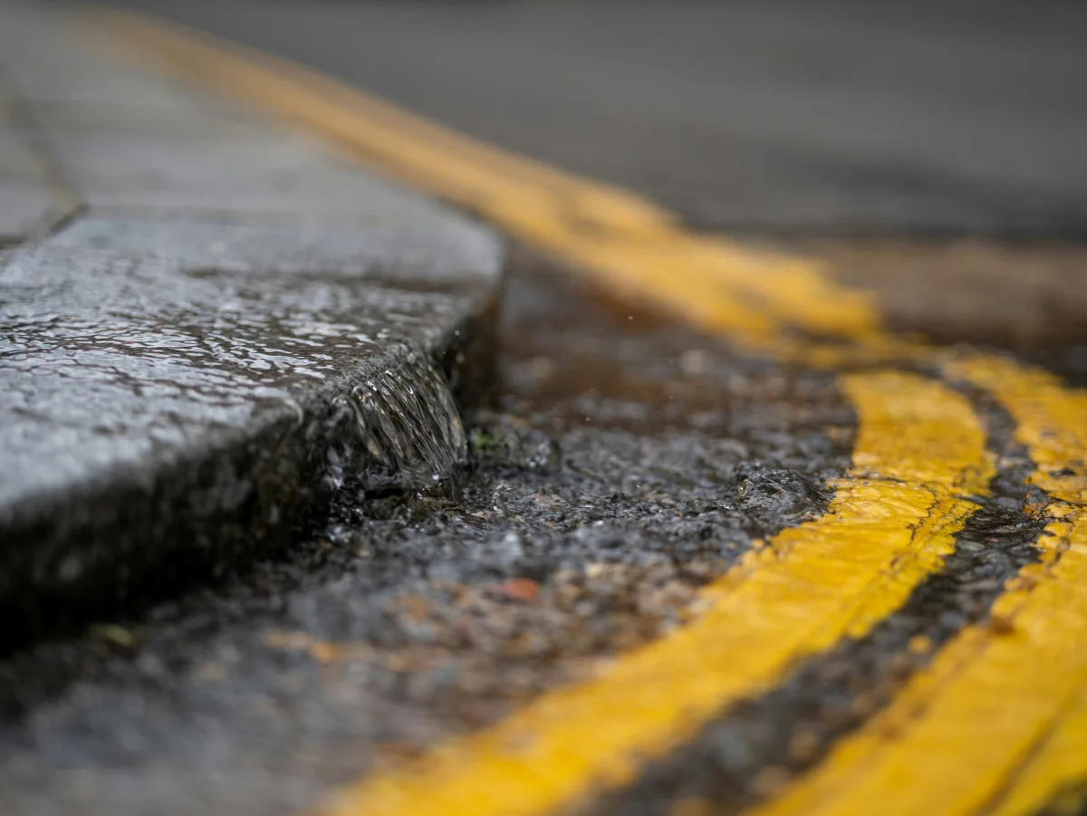 Stormwater running cleaning on roadway