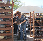 Woman Shopping for Pottery at Fort Ligonier Days
