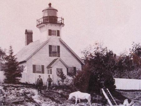 A historic photo of the lighthouse (notice the white horse!)
