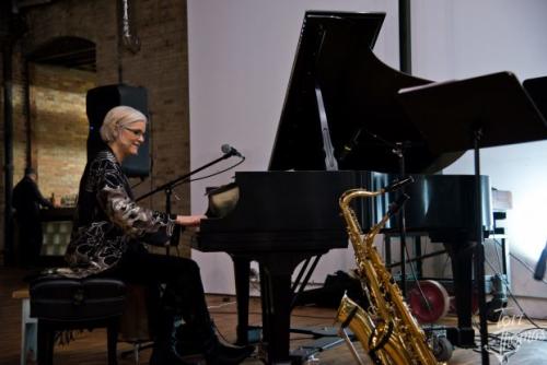 Robin Connell playing piano in Grand Rapids