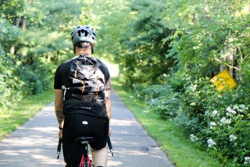 Cycler on the White Pine Trail in Grand Rapids