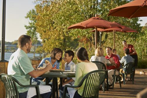 Diners at Roses on Reeds Lake patio in Grand Rapids