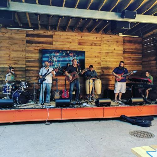 Band performing on the Knickerbocker Outdoor Stage in Grand Rapids
