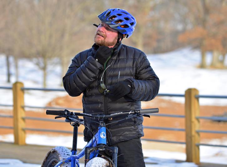 Nate Phelps of Central District Cyclery removing his helmet