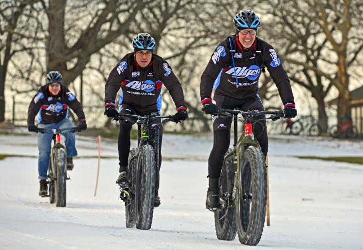 Alger Bike team members on fatbikes in Grand Rapids