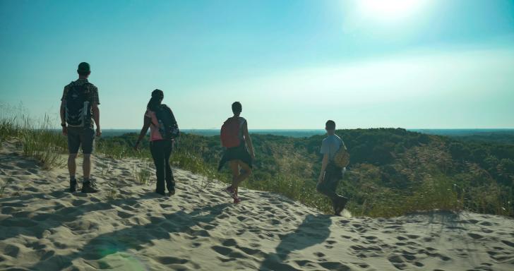 People Hiking at PJ Hoffmaster State Park in Michigan