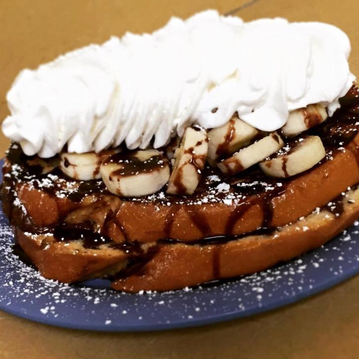 French toast with bananas and whipped cream from Real Food Cafe