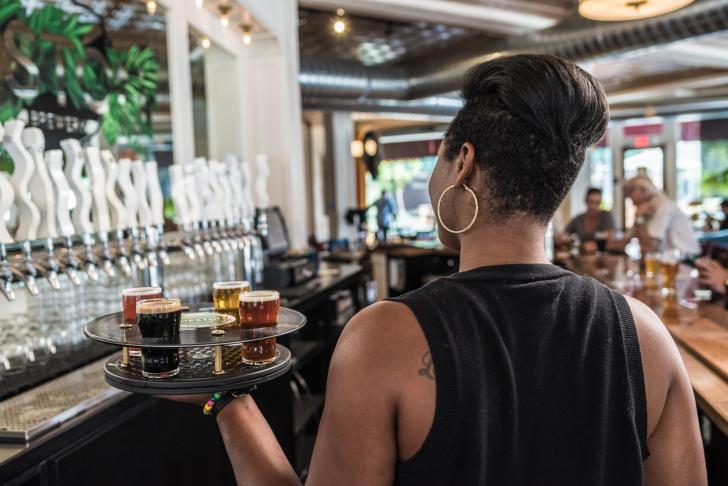 Server with the Record Flight at Creston Brewery in Grand Rapids