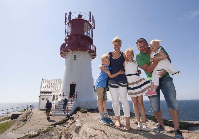 Top Attractions In Southern Norway What To See Visit Family Smiling In Front Of Lindesnes Lighthouse