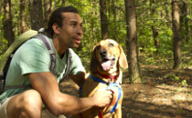 Man Hiking with Dog - Outdoor Adventure