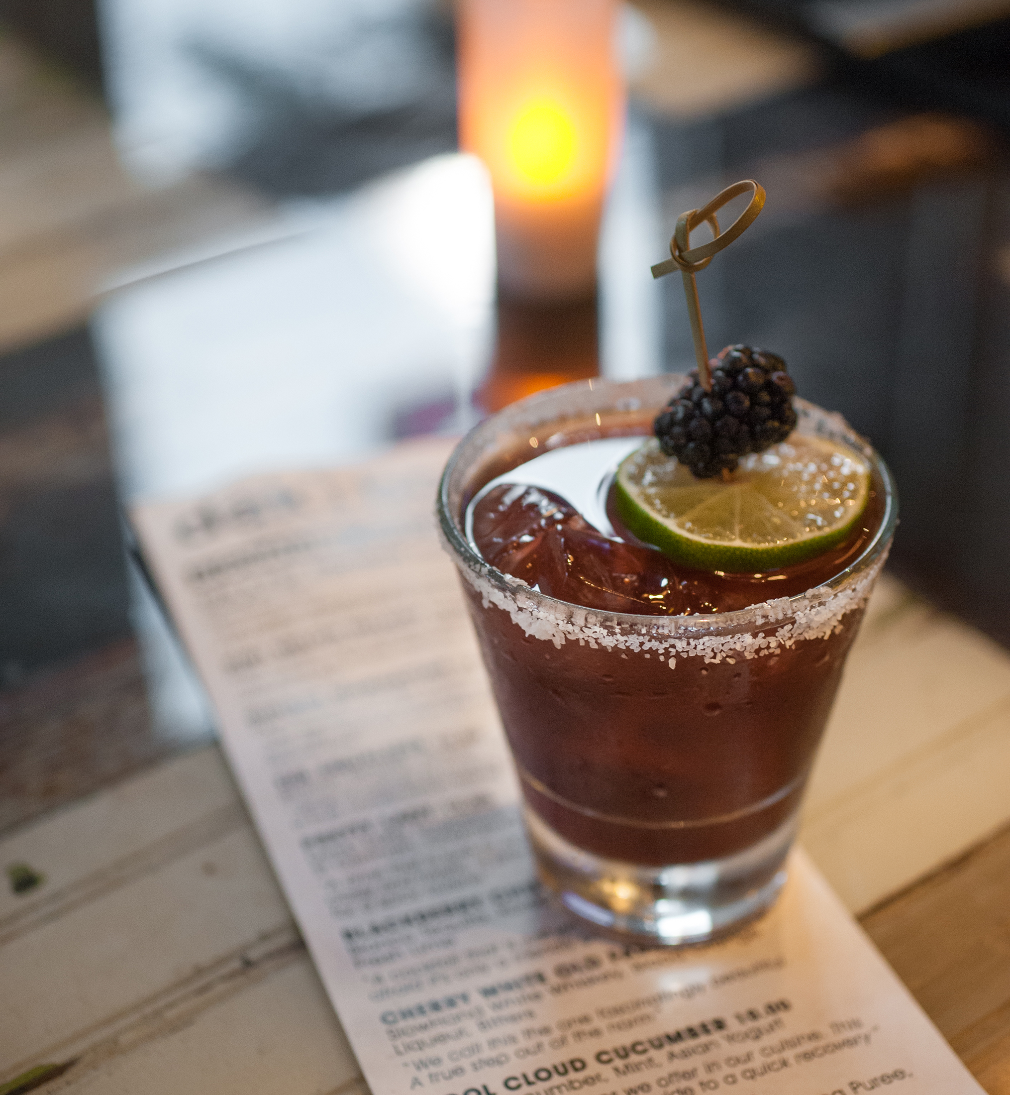 Cocktail and Menu at a Houston lounge