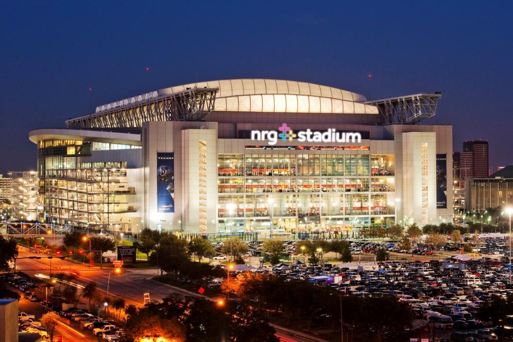 Night view of the NRG Stadium in Houston, Teax lit up for an event.