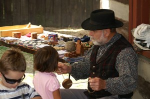 Re-enactors provide hands-on activities for children.