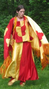 Mary Tippman dances in Miami Indian clothing