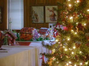 Soft lights from delicate trees illuminate the Festival of Gingerbread display room.