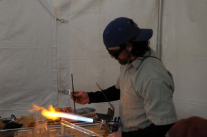 Join local artist Eran Park as he blows glass at Maker Faire 2014.