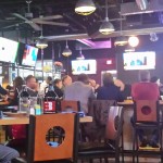 More than a dozen large televisions surround the bar area at Scotty's.