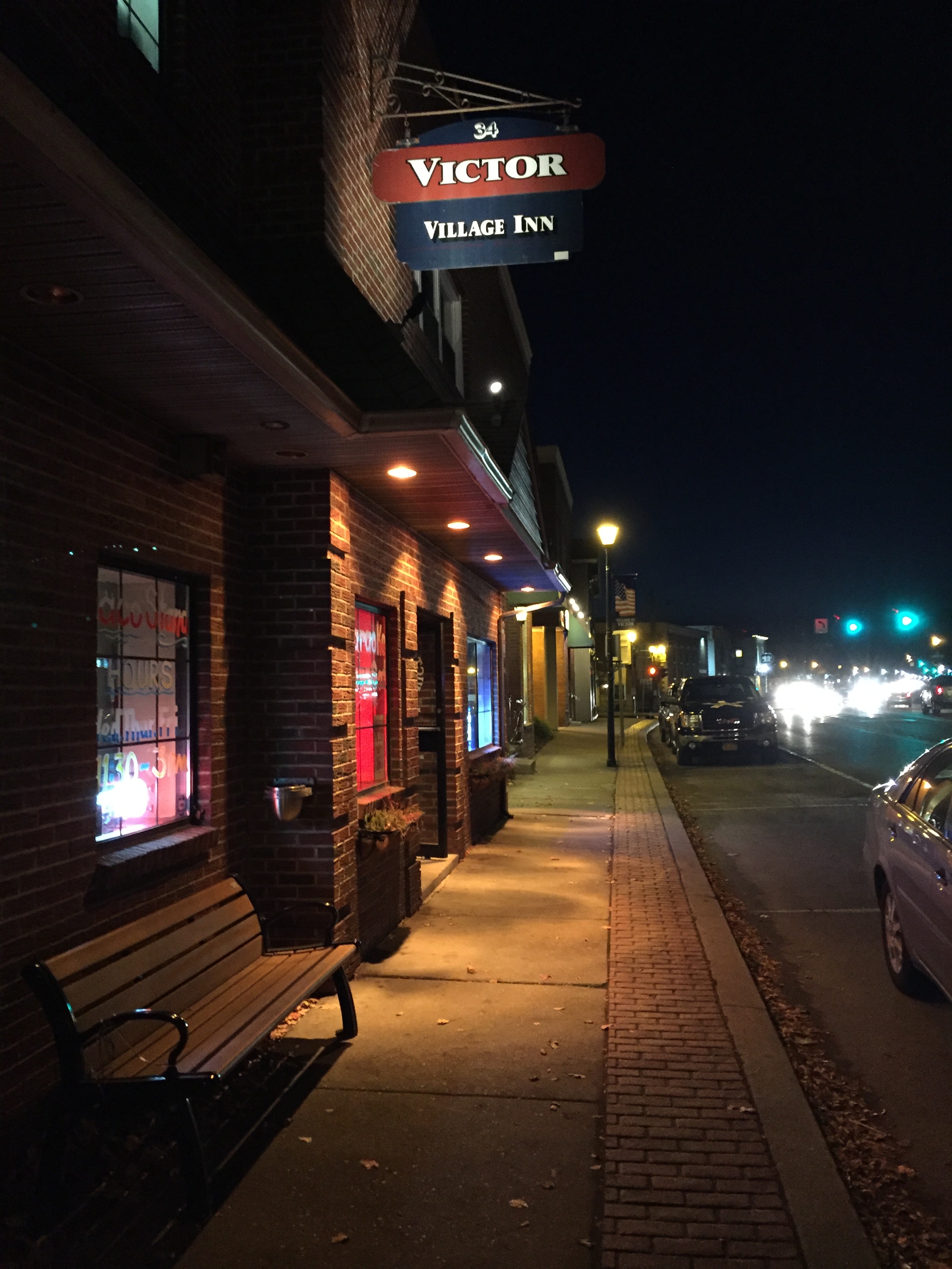 Exterior shot of Victor Village Inn at night