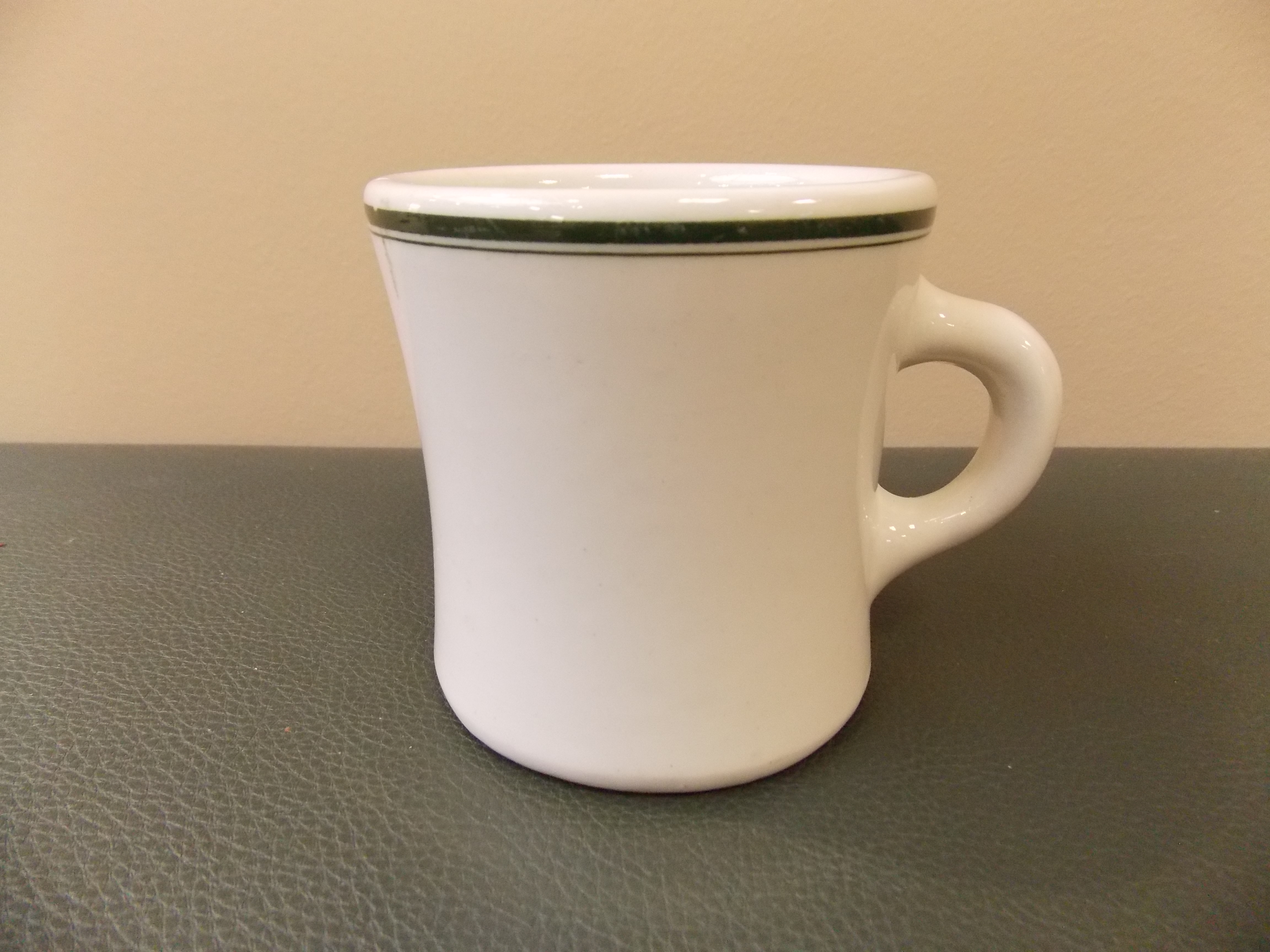 A single Victor mug with stripe