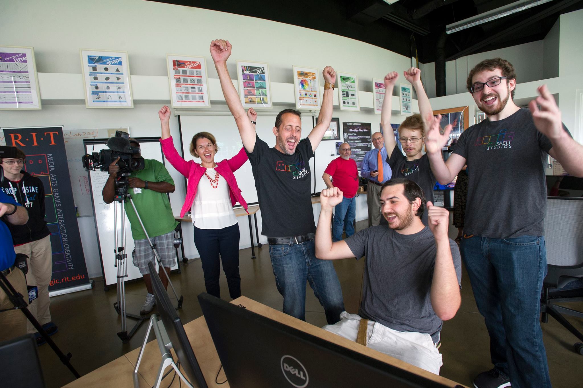 Students and Faculty at the MAGIC Center at Rochester Institute of Technology cheering