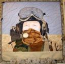 Joan Ballew made this quilt to honor a wounded U.S. Marine – her son - using the zipper, fabric and buttons from his uniform.