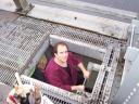 Bertolozzi climbing down to the traveler below the roadway deck