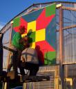 A Hand-painted quilt square goes up at Partyka Farms
